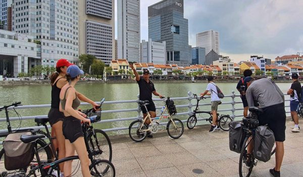 Bike tour guests along the Singapore River route